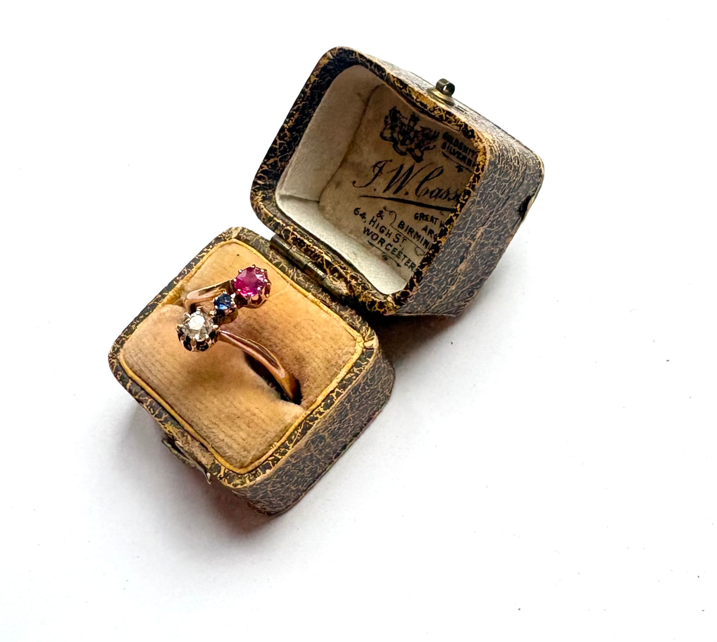 Early 20th century gold diamond, ruby and sapphire three-stone ring