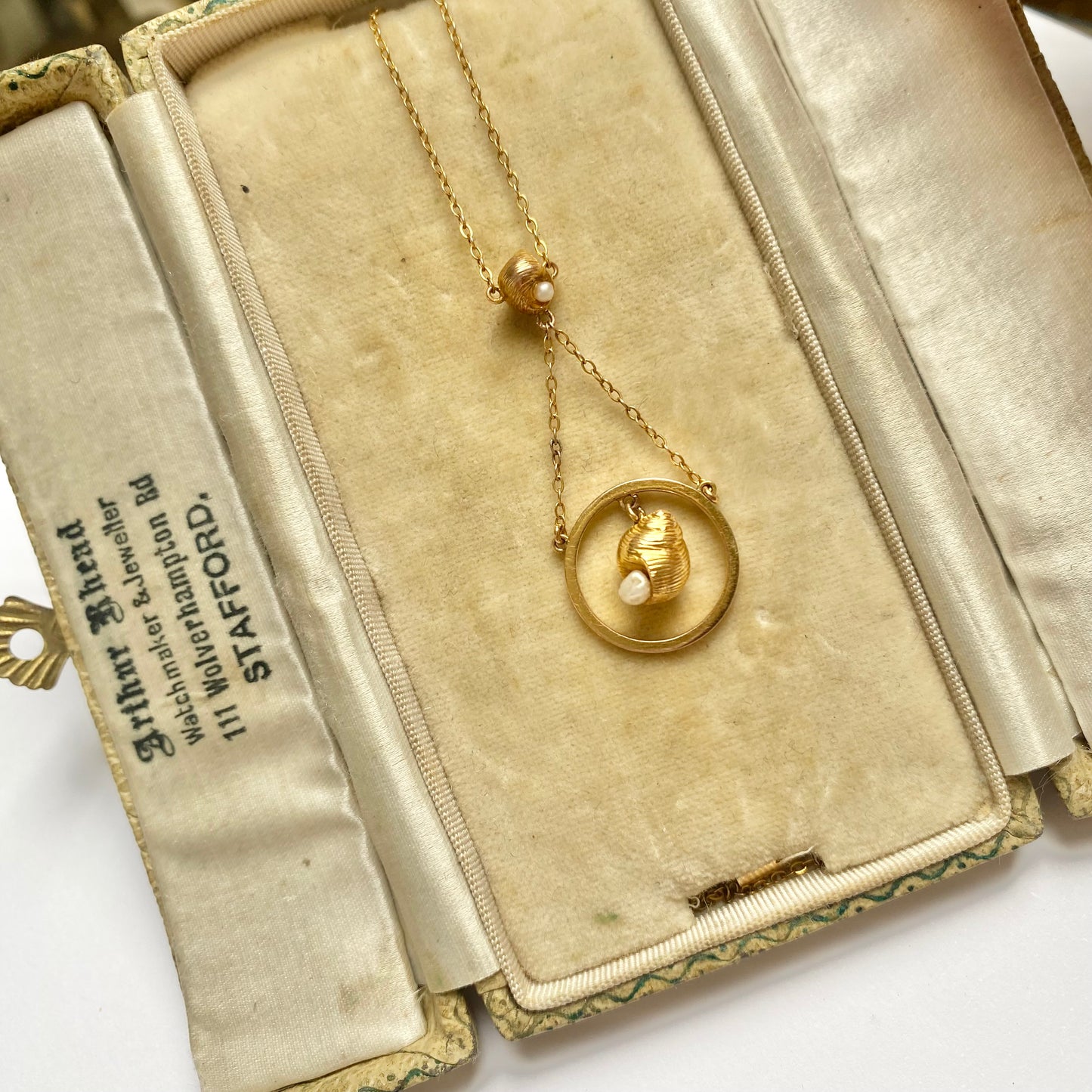 A very pretty antique early 20th century seed pearl and double drop  pendant, with chain