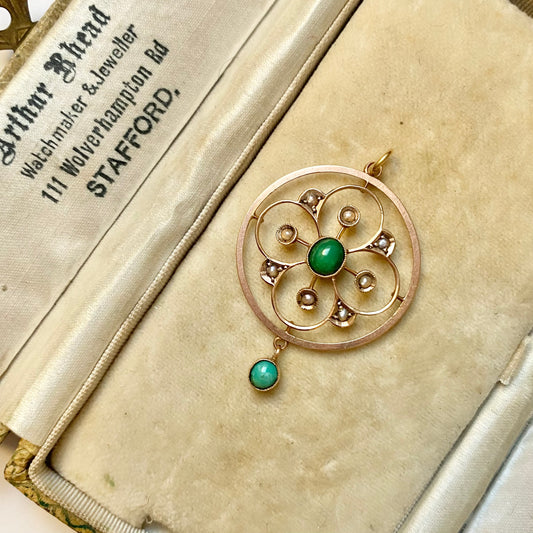 A very pretty antique early 20th century Edwardian split pearl and turquoise openwork floral pendant