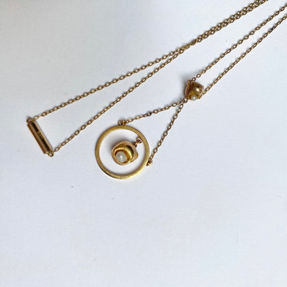 A very pretty antique early 20th century seed pearl and double drop  pendant, with chain
