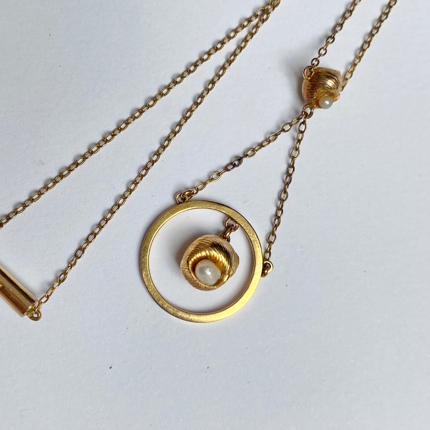 A very pretty antique early 20th century seed pearl and double drop  pendant, with chain