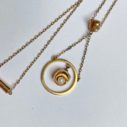 A very pretty antique early 20th century seed pearl and double drop  pendant, with chain