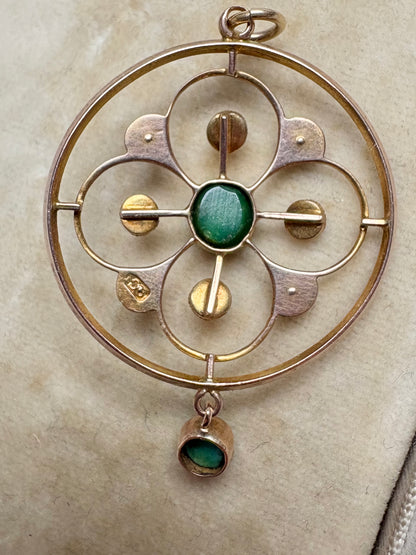 A very pretty antique early 20th century Edwardian split pearl and turquoise openwork floral pendant