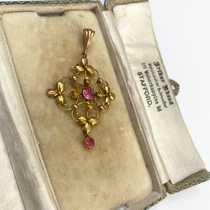 A very pretty antique early 20th century pink paste floral / flower pendant.