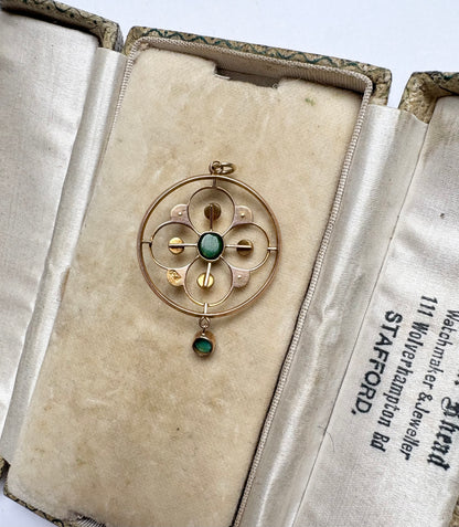 A very pretty antique early 20th century Edwardian split pearl and turquoise openwork floral pendant