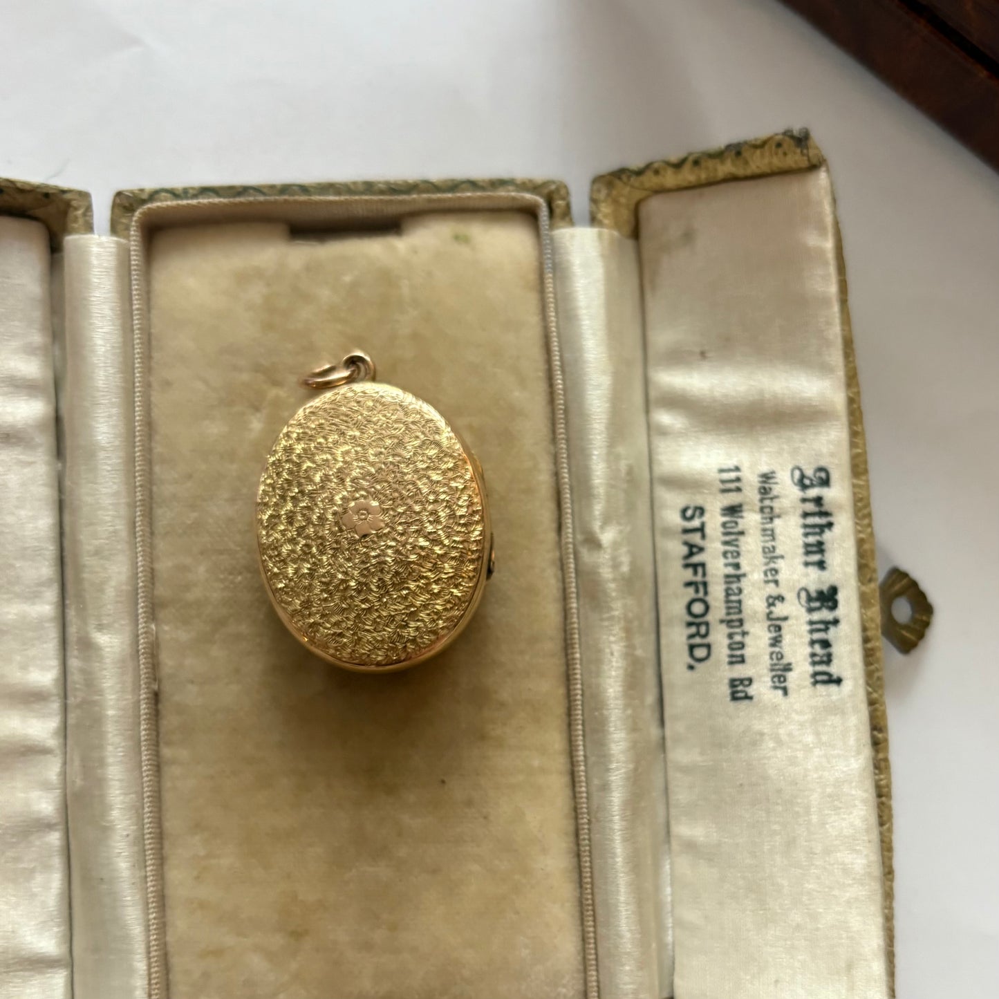 Antique Victorian gold enamel and split pearl locket