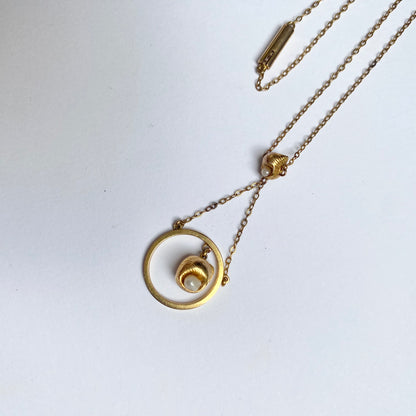 A very pretty antique early 20th century seed pearl and double drop  pendant, with chain