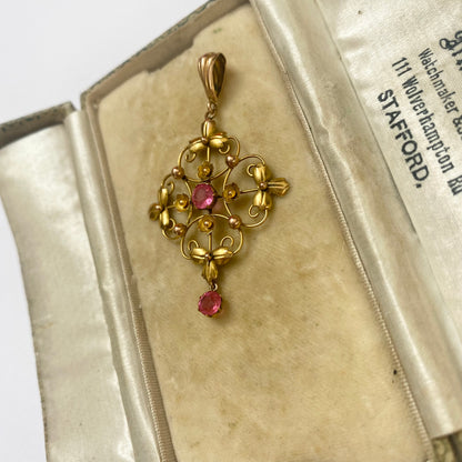 A very pretty antique early 20th century pink paste floral / flower pendant.