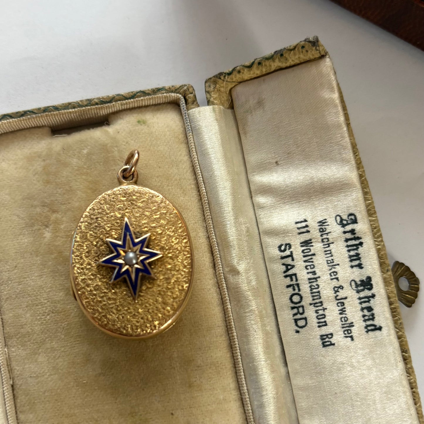 Antique Victorian gold enamel and split pearl locket