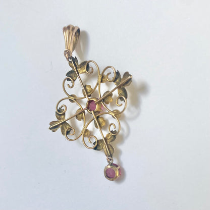 A very pretty antique early 20th century pink paste floral / flower pendant.