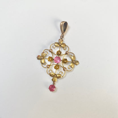 A very pretty antique early 20th century pink paste floral / flower pendant.