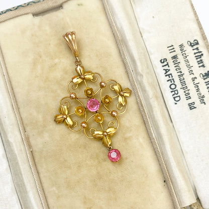 A very pretty antique early 20th century pink paste floral / flower pendant.