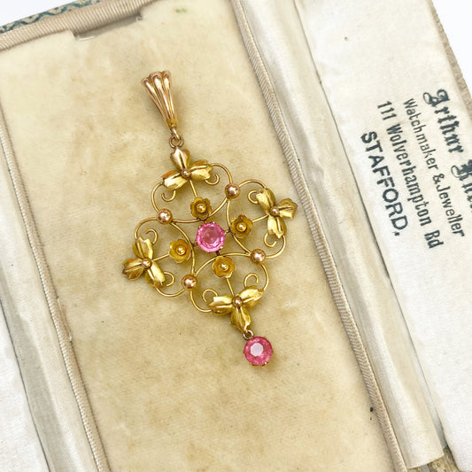 A very pretty antique early 20th century pink paste floral / flower pendant.