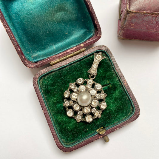 Antique early 20th century silver, colourless paste and imitation pearl cluster pendant.