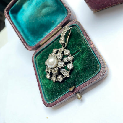 Antique early 20th century silver, colourless paste and imitation pearl cluster pendant.