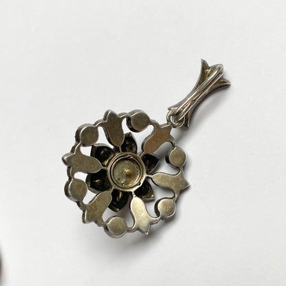 Antique early 20th century silver, colourless paste and imitation pearl cluster pendant.