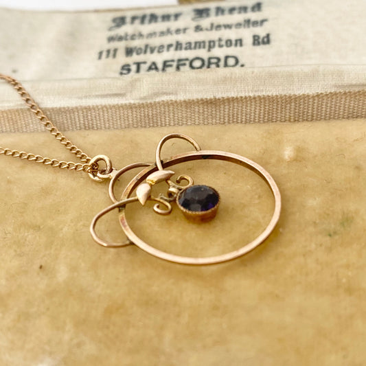 An Art Nouveau gold amethyst pendant, with chain.