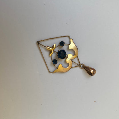 Early 20th century 9ct gold kite-shape pendant, set with sapphires.