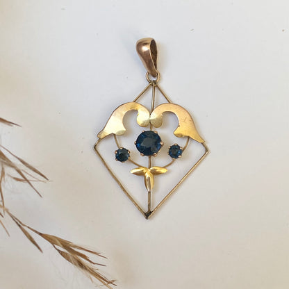 Early 20th century 9ct gold kite-shape pendant, set with sapphires.