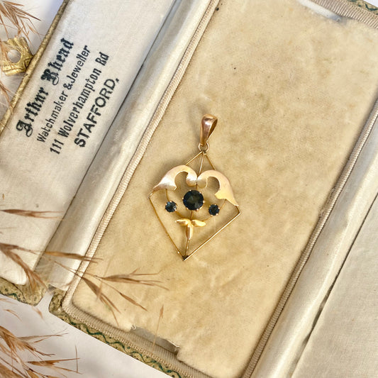 Early 20th century 9ct gold kite-shape pendant, set with sapphires.